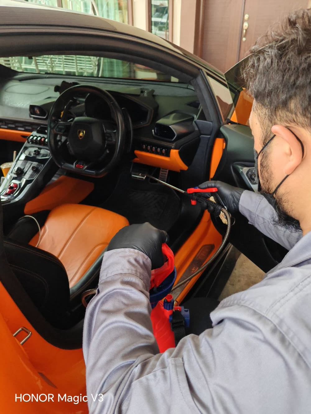 Certified technician performing Sertu on a sports car cabin